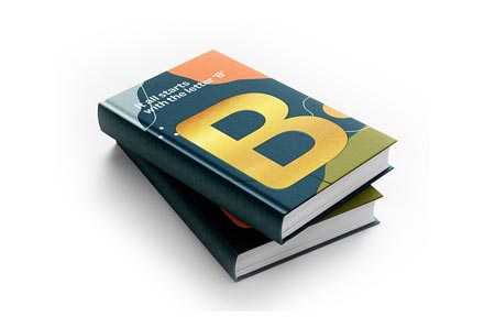 hardback book with gold foiled letters on cover